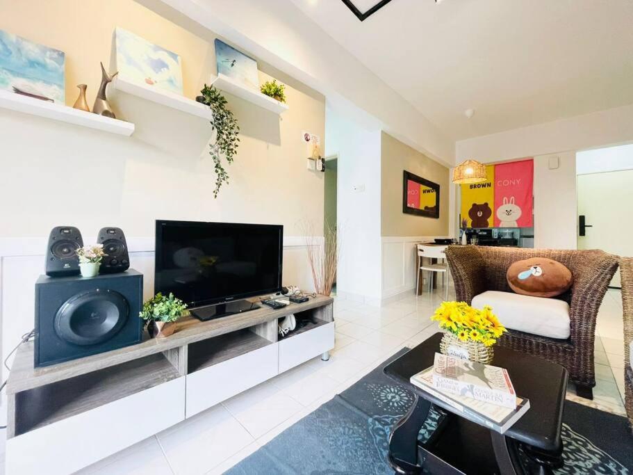 A television and/or entertainment centre at 8 pax Homestay near Axiata Arena & Pavilion 2