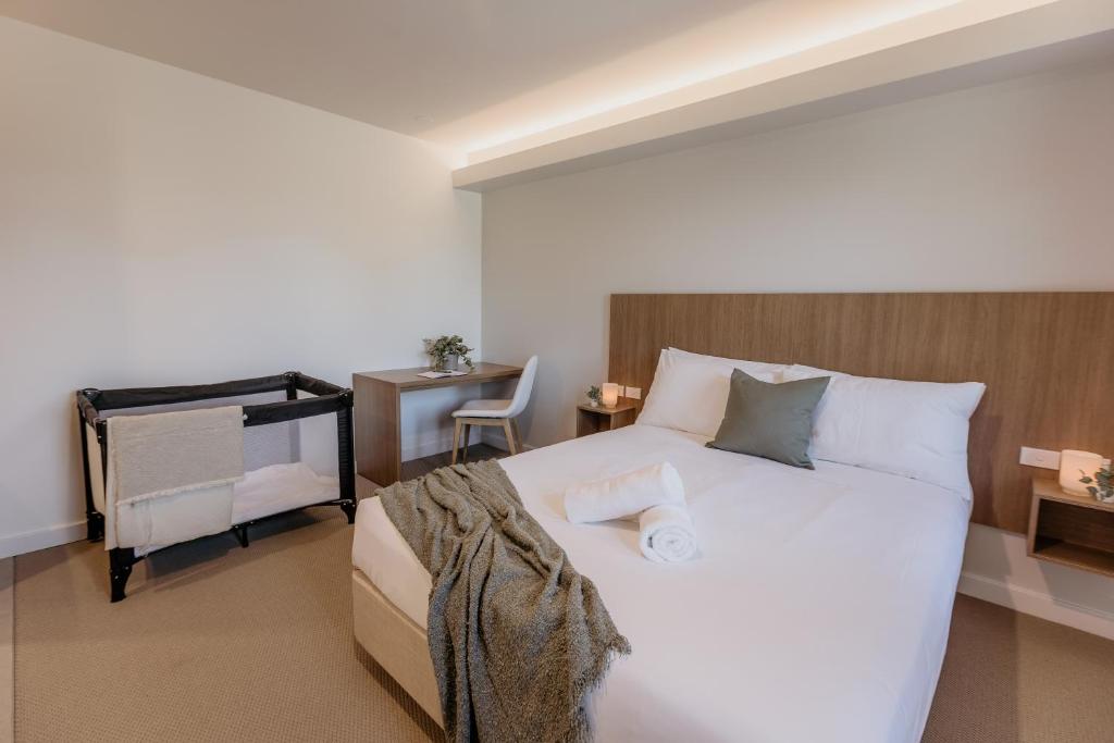 Postel nebo postele na pokoji v ubytování Beach & Bay Stay Motel