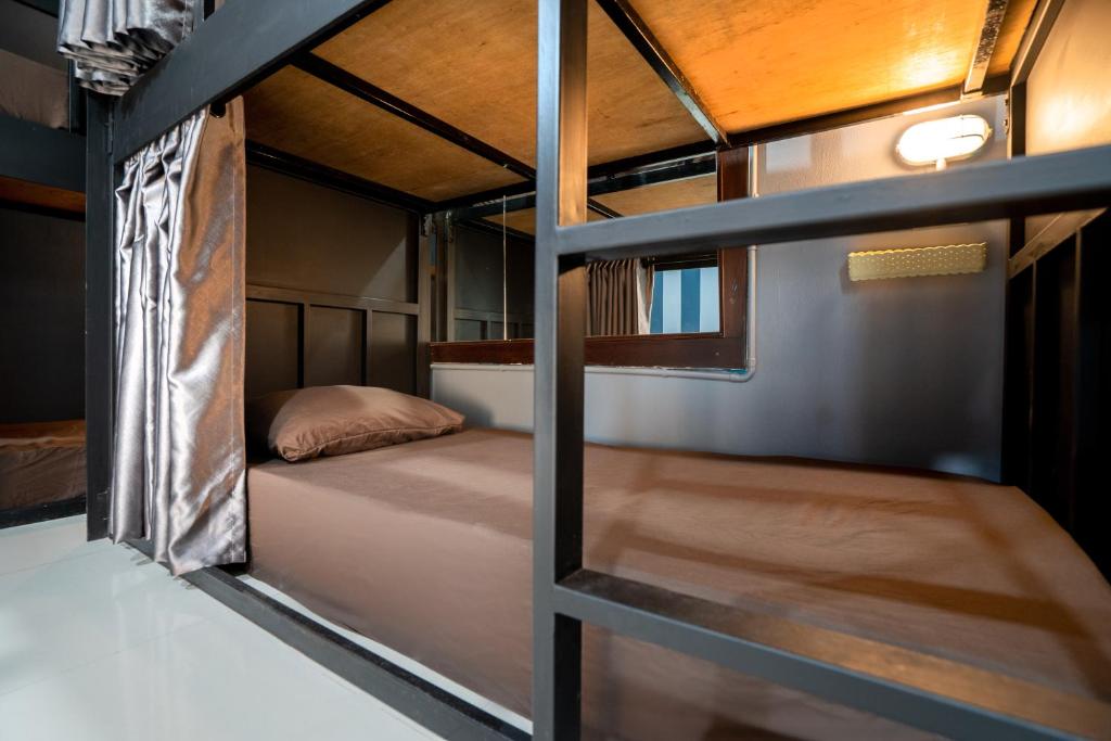 Postel nebo postele na pokoji v ubytování Black Pantera Hostel