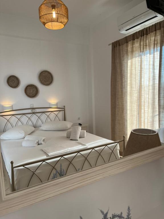 Postel nebo postele na pokoji v ubytování Hotel Chrisoula