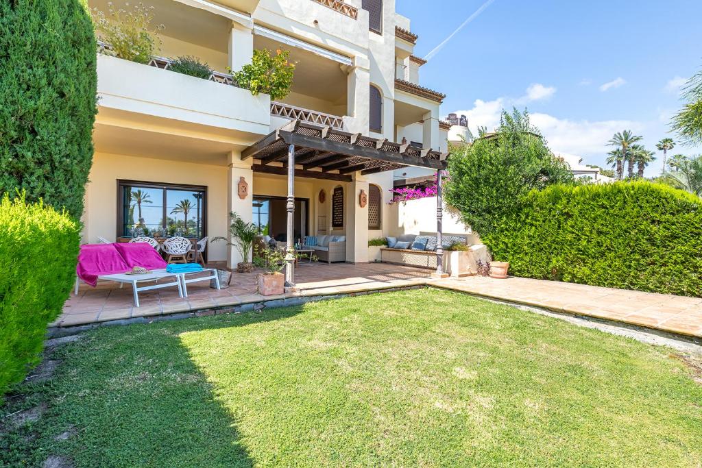 a house with a lawn in front of it at BELLA GADEA in Altea