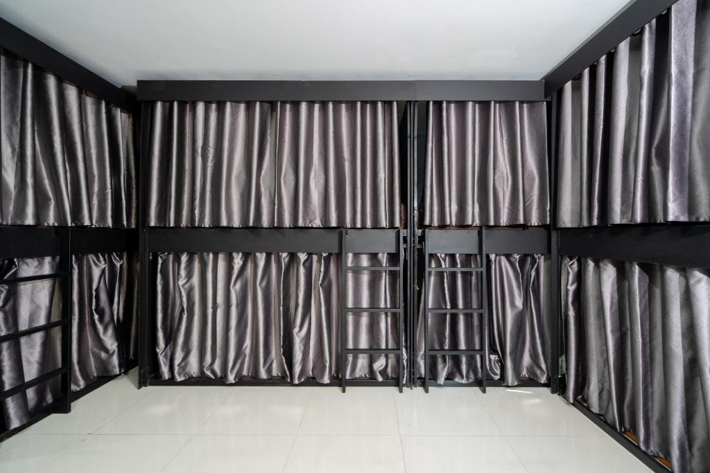 Postel nebo postele na pokoji v ubytování Black Pantera Hostel
