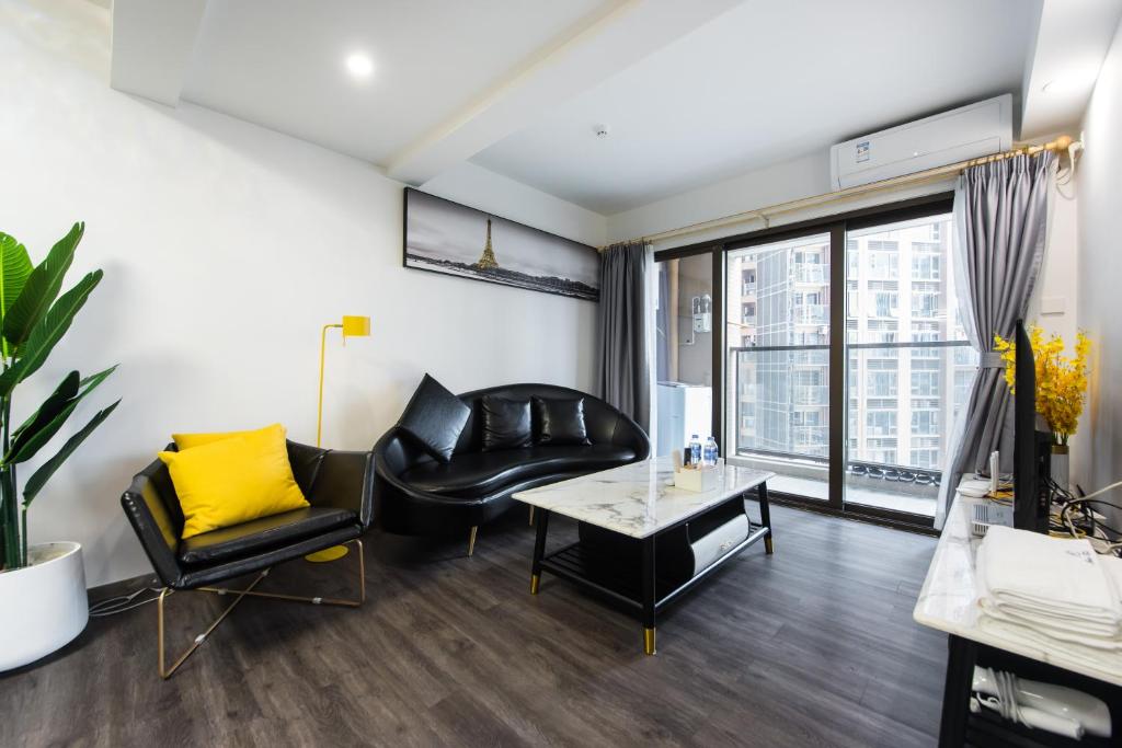 Posezení v ubytování WESU Weisu Executive Apartment Shenzhen Shenda Metro Store