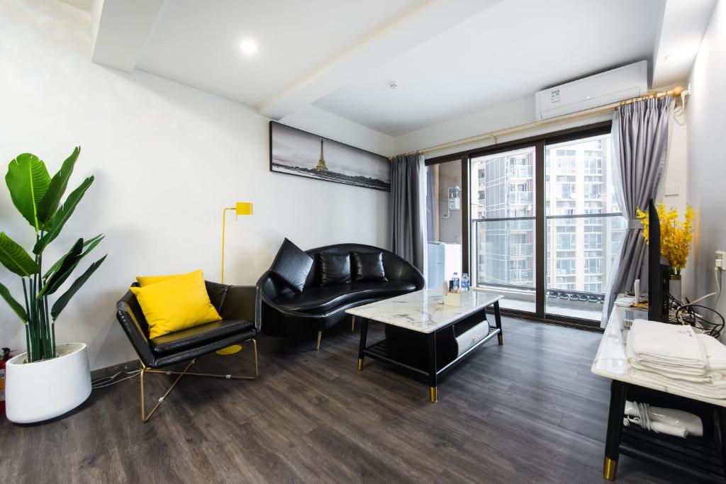 Posezení v ubytování WESU Weisu Executive Apartment Shenzhen Shenda Metro Store