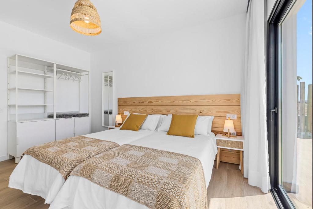 Postel nebo postele na pokoji v ubytování Villa Ayala