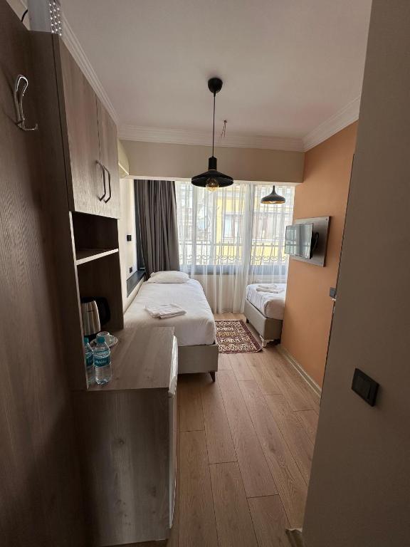 Postel nebo postele na pokoji v ubytování Terrace Guesthouse