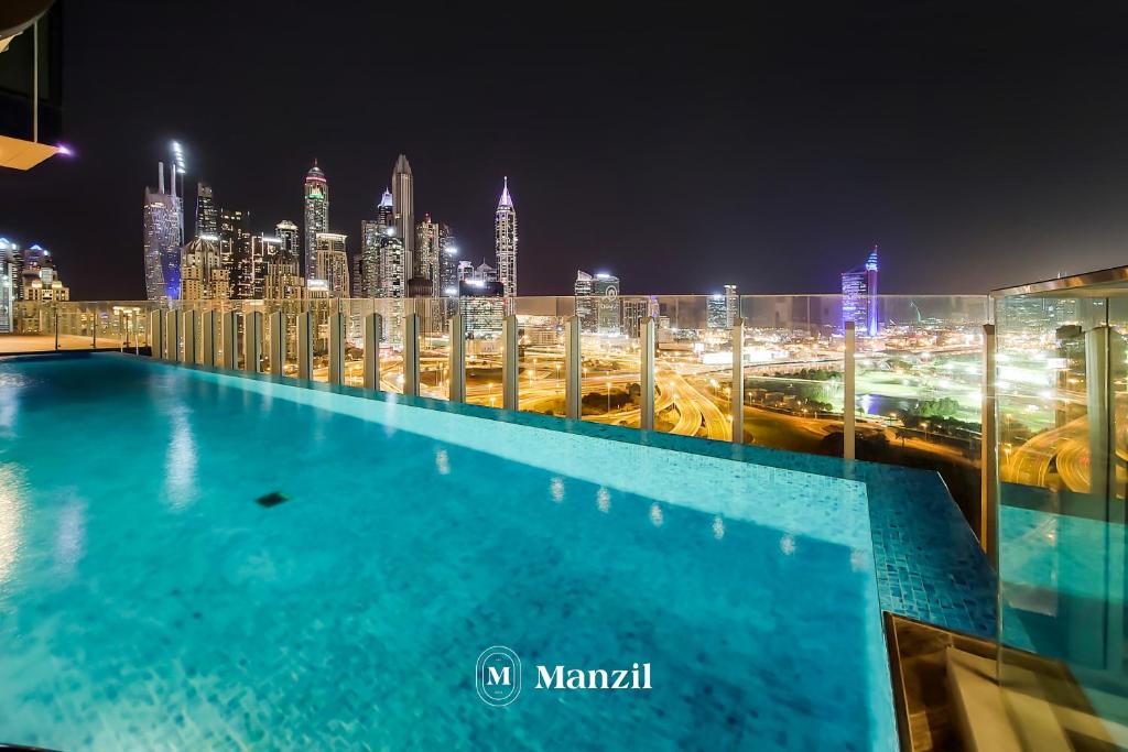 Fotografie z fotogalerie ubytování Manzil - Luxury 3BR in Taj Residencies with Golf Course and Dubai Skylines Views v Dubaji