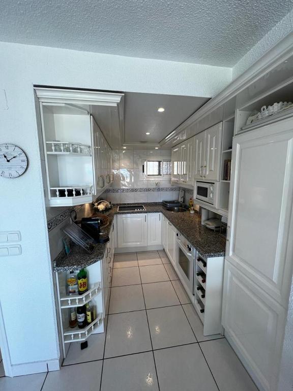 Kuchyň nebo kuchyňský kout v ubytování Apartamento Caleta Playa