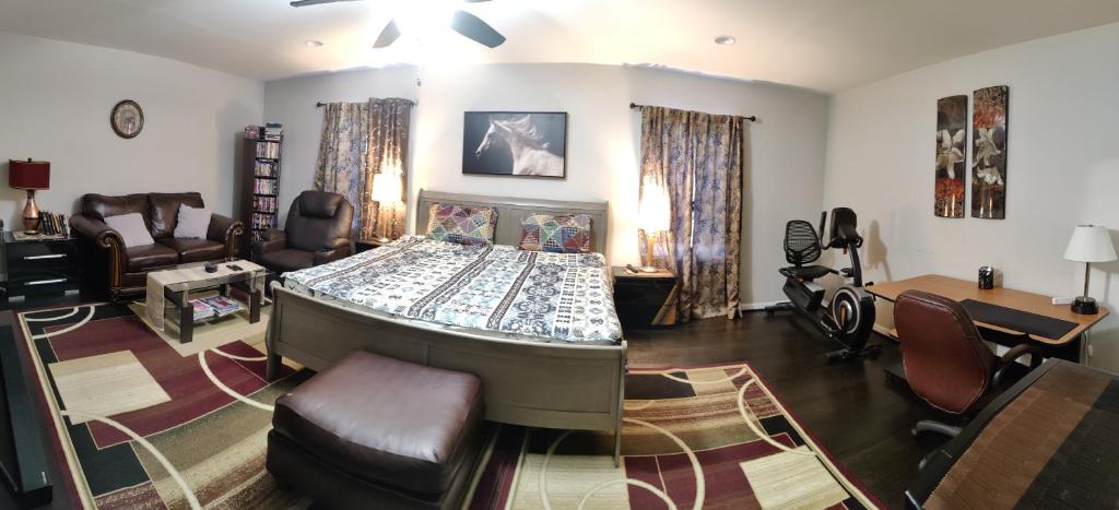 a living room with a bed in the middle of it at Luxurious stay at prime location in Herndon