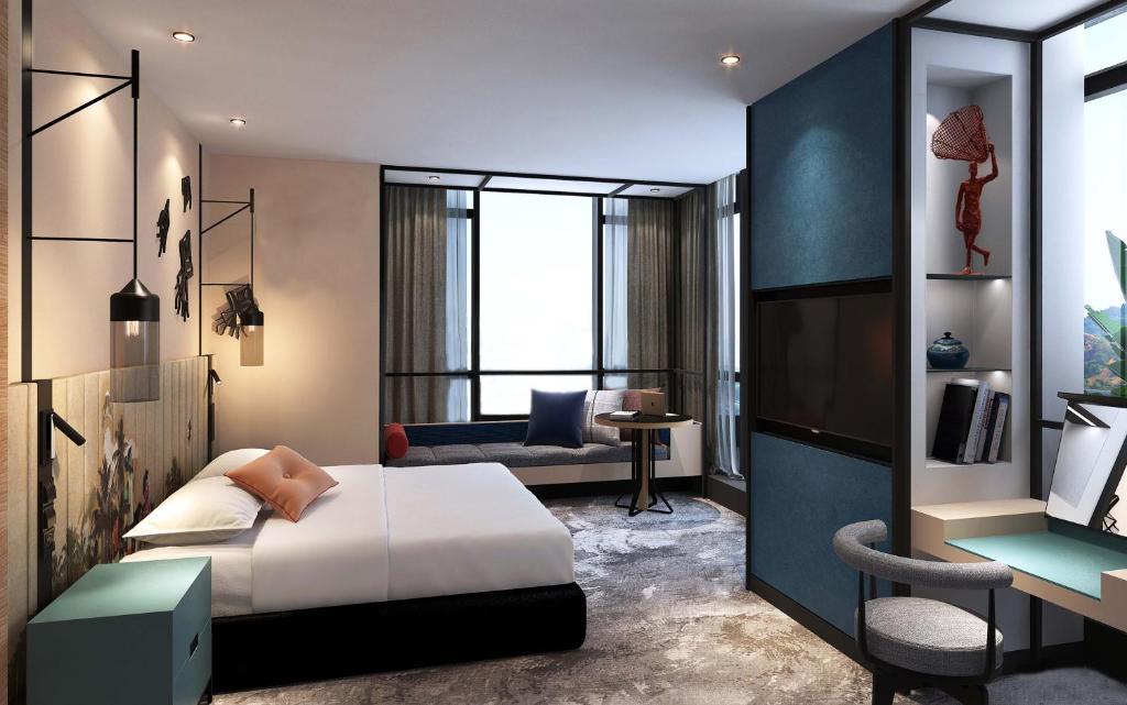 Postel nebo postele na pokoji v ubytování Courtyard by Marriott Colombo