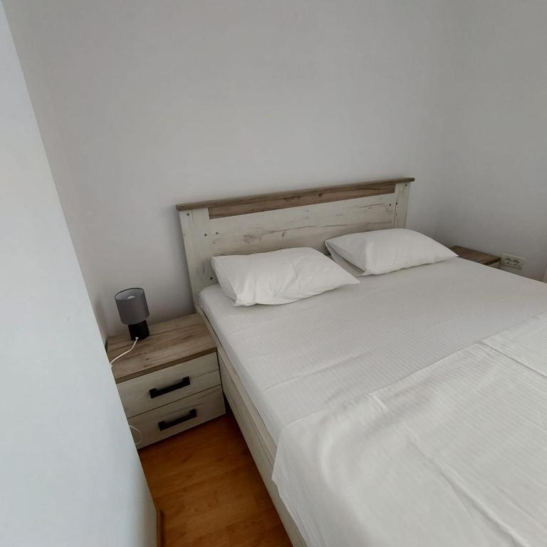 Postel nebo postele na pokoji v ubytování Rio Apartament