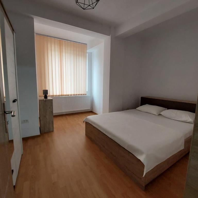 Postel nebo postele na pokoji v ubytování Rio Apartament