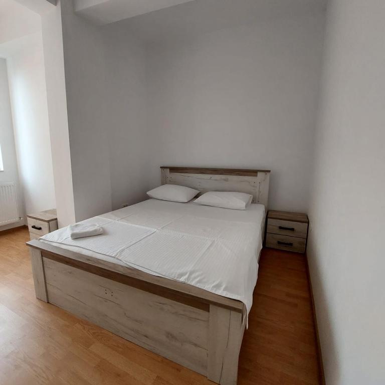 Postel nebo postele na pokoji v ubytování Rio Apartament