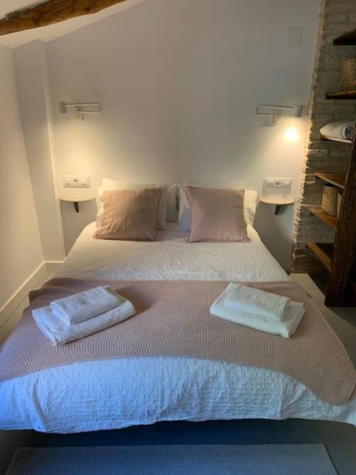 A bed or beds in a room at Casa Valleta