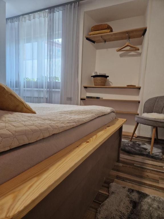 Postel nebo postele na pokoji v ubytování FRIZ&FANY Postojna City Center