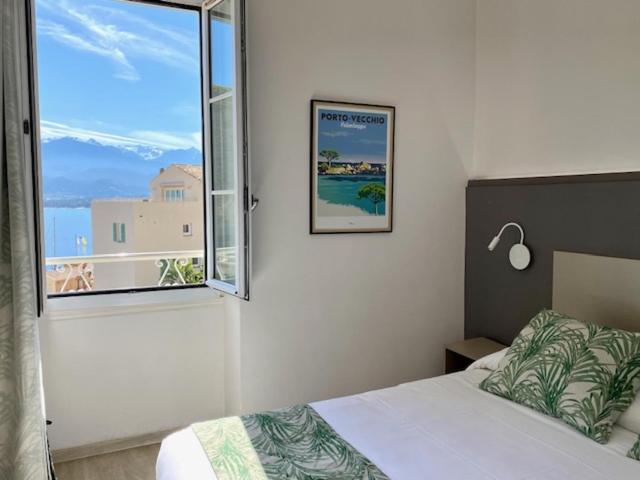 Postel nebo postele na pokoji v ubytování Hotel Belvedere