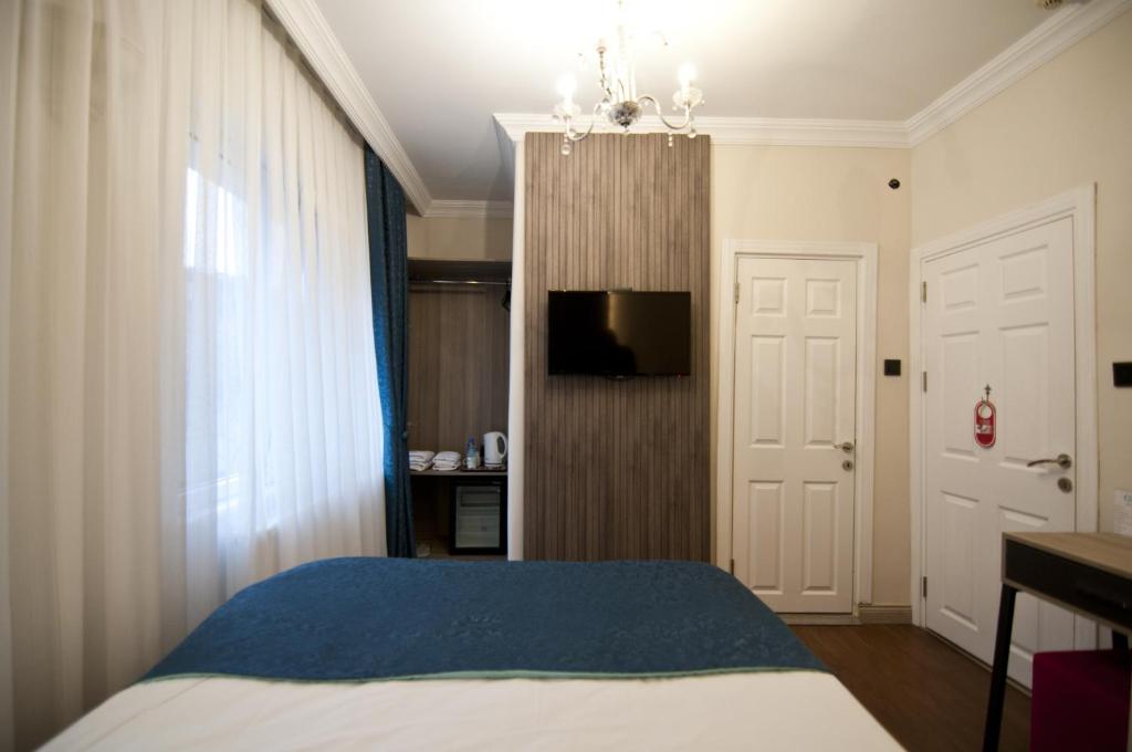 Postel nebo postele na pokoji v ubytování Genius Hotel Istanbul