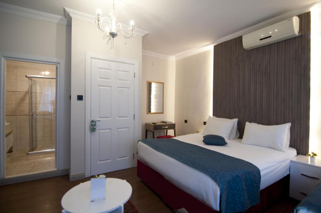 Postel nebo postele na pokoji v ubytování Genius Hotel Istanbul