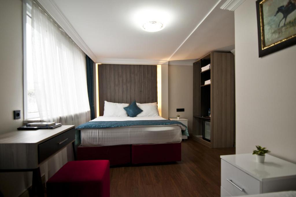 Postel nebo postele na pokoji v ubytování Genius Hotel Istanbul