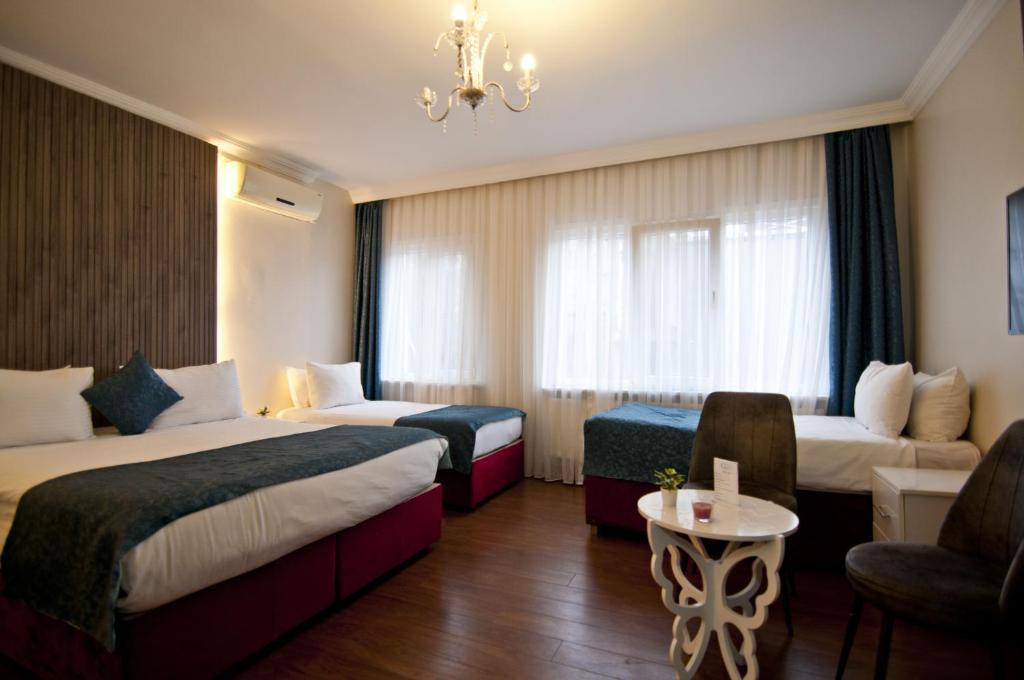 Postel nebo postele na pokoji v ubytování Genius Hotel Istanbul
