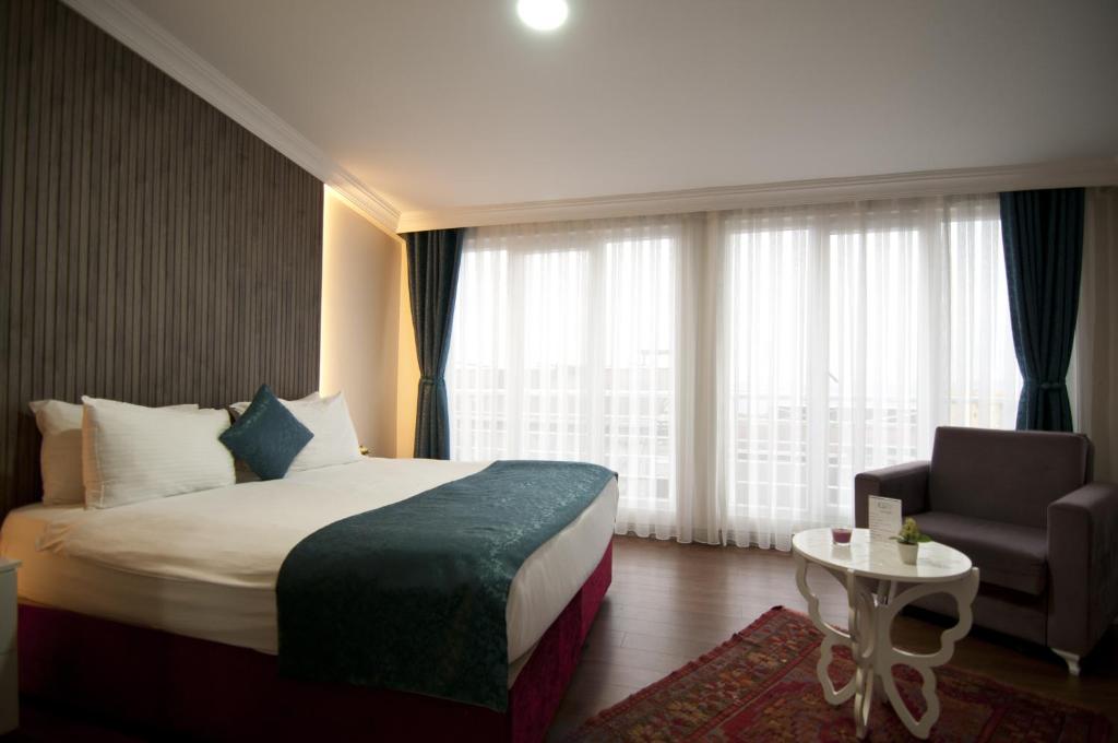 Postel nebo postele na pokoji v ubytování Genius Hotel Istanbul