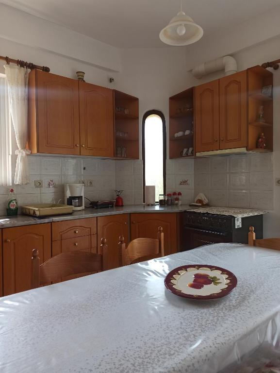 Kuchyň nebo kuchyňský kout v ubytování Happy Days Apartment