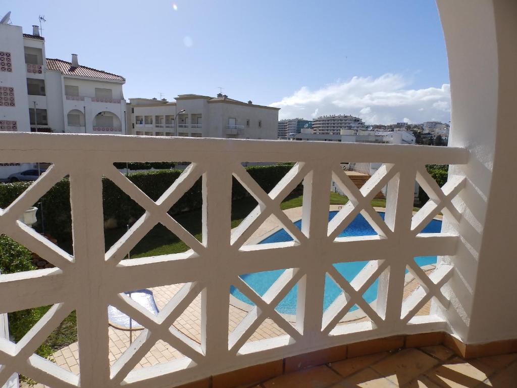 a balcony with a view of the city at Alta Oura in Albufeira