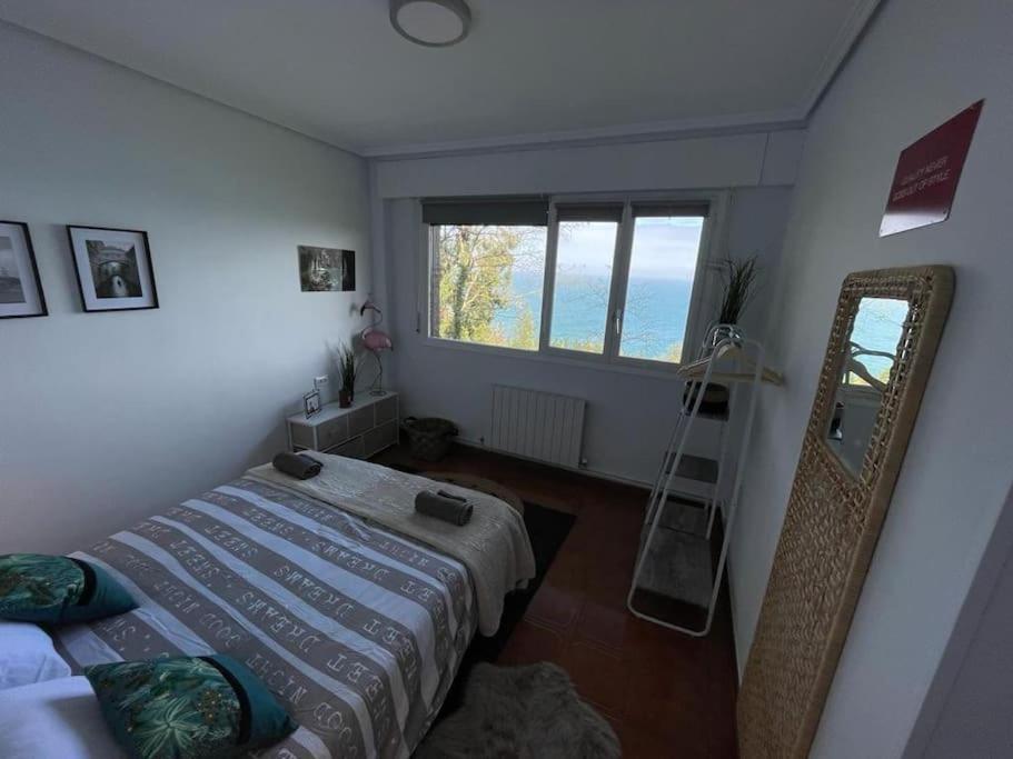 Postel nebo postele na pokoji v ubytování Singular costa Bizkaia Elantxobe Urdaibai