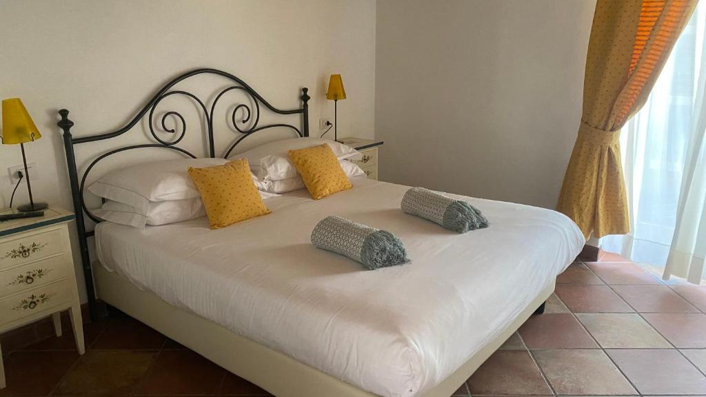 Posteľ alebo postele v izbe v ubytovaní Il Mulino di Hotel Villa Aurora