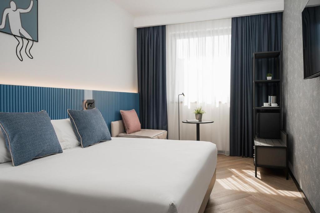 Posteľ alebo postele v izbe v ubytovaní Mitico Hotel & Natural Spa