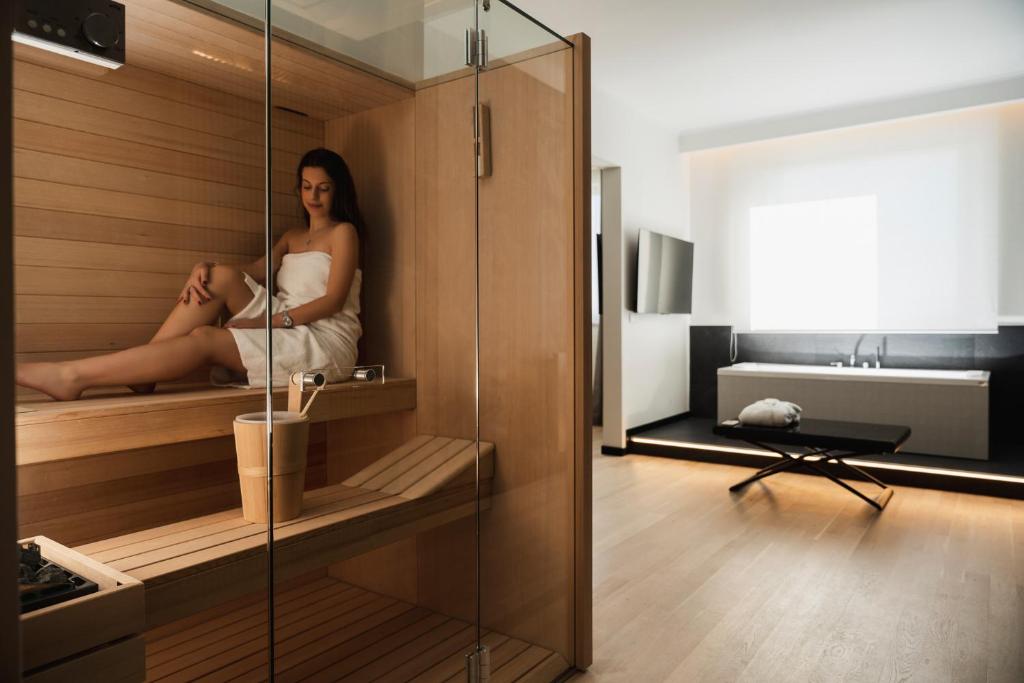 Televízia a/alebo spoločenská miestnosť v ubytovaní Mitico Hotel & Natural Spa