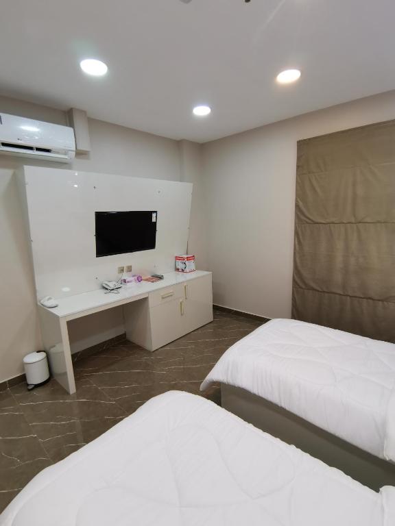 مارينا للغرف الفندقية - Habitación Gemela Con Inodoro Compartido
