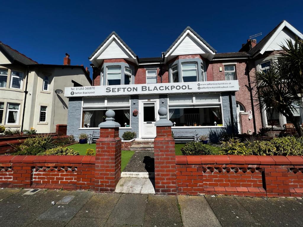 a house with a sign that reads station blackpool at The Sefton Blackpool in Blackpool