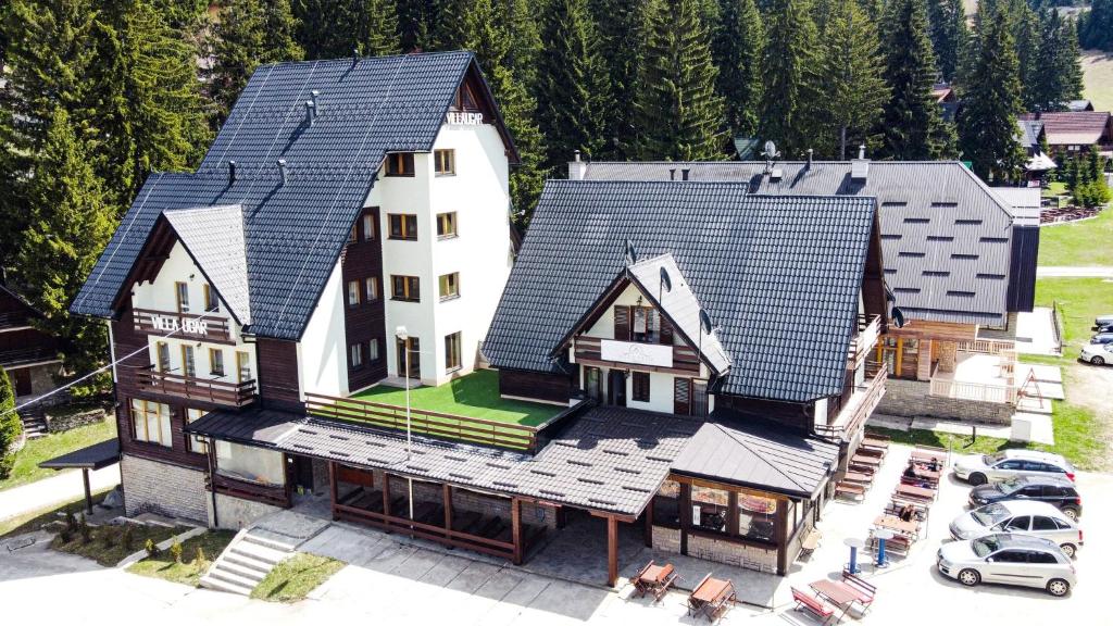 an aerial view of a house with a roof at Hotel Villa Ugar Vlašić in Vlasic