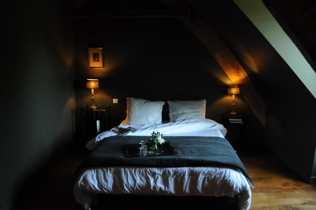Postel nebo postele na pokoji v ubytování Manoir de la Villeneuve