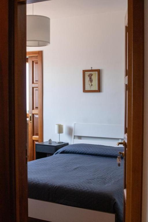 A bed or beds in a room at Villa Cipriano