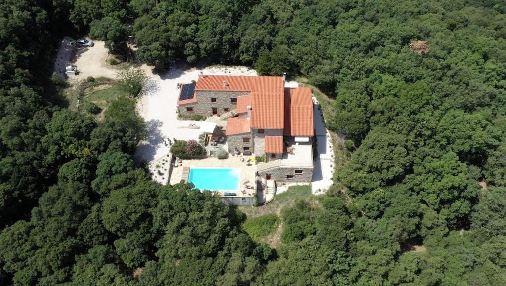 an aerial view of a house in the woods at Wanakaset Pyrénées Orientales in Argelès-sur-Mer
