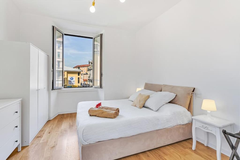 Кровать или кровати в номере Alessia's Flat - San Luigi