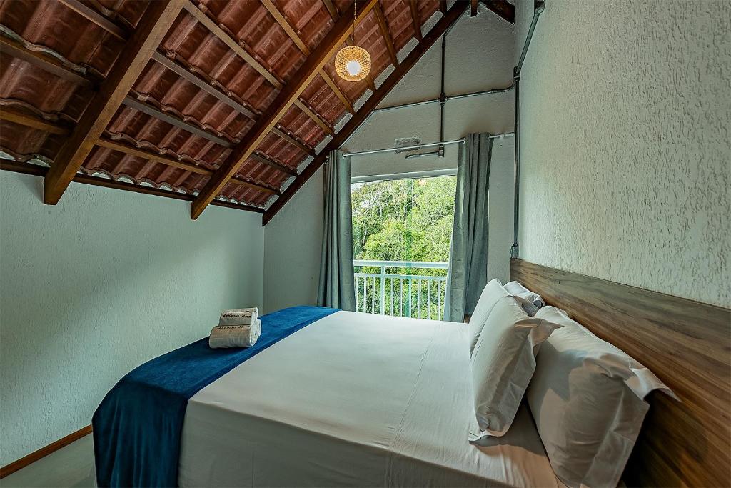Postel nebo postele na pokoji v ubytování Antiquus ApartHotel