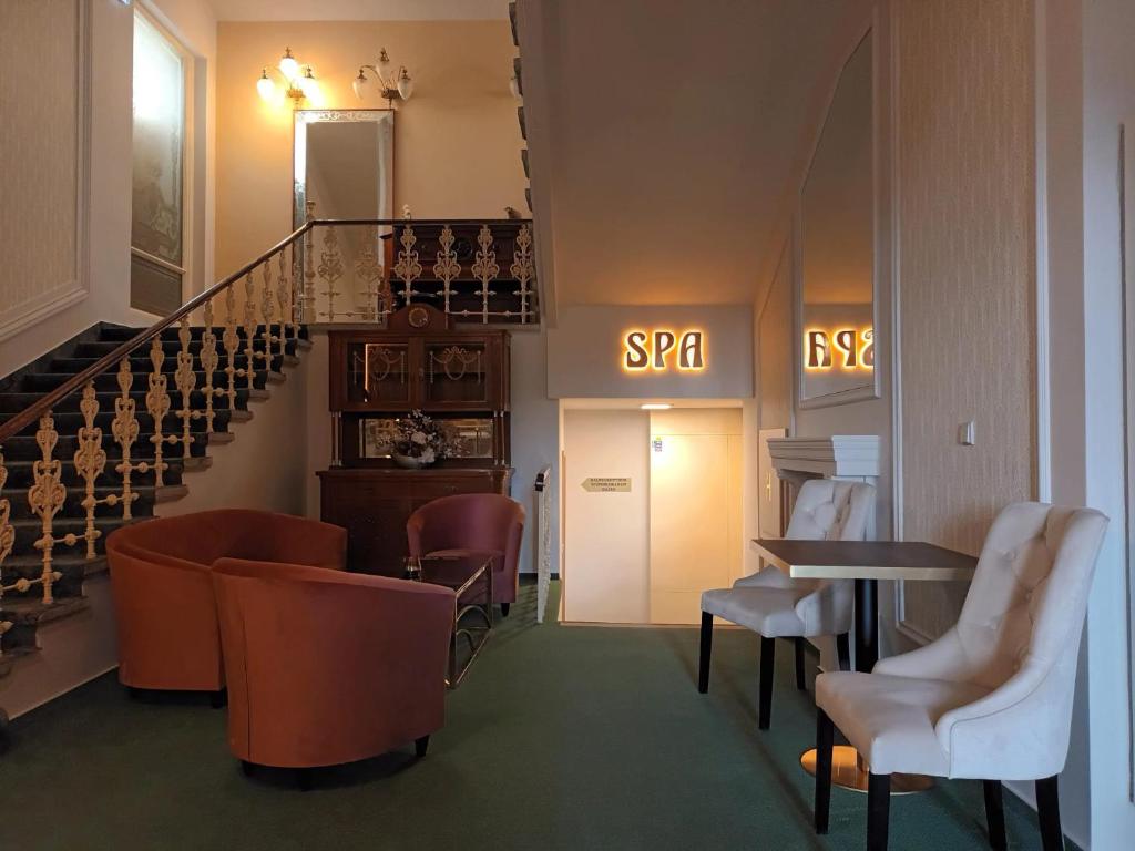 Posezení v ubytování Hotel Maxim