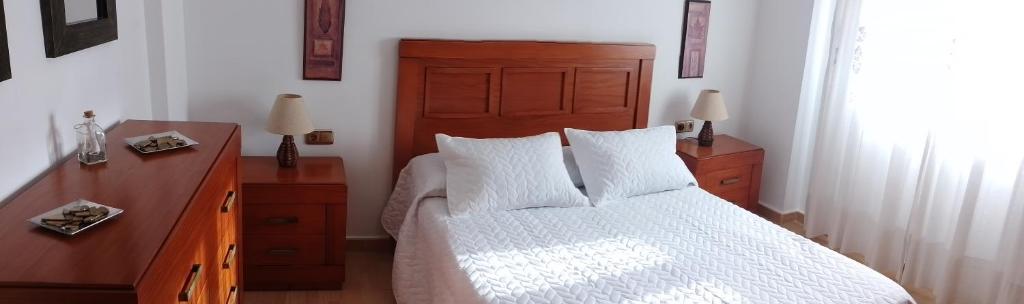 Postel nebo postele na pokoji v ubytování Piso plaza Cantarero