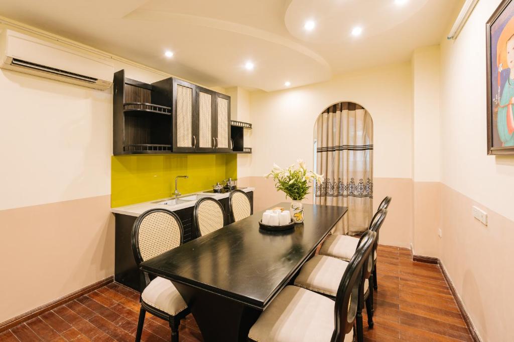 Kuchyň nebo kuchyňský kout v ubytování Sun Clover Boutique Hotel