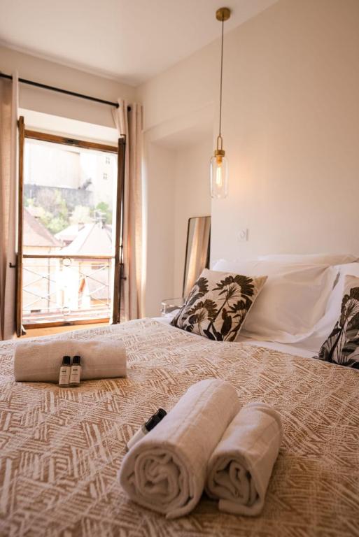 Posteľ alebo postele v izbe v ubytovaní La Suite du 10 - Nice studio with view on the Canal and the Castle