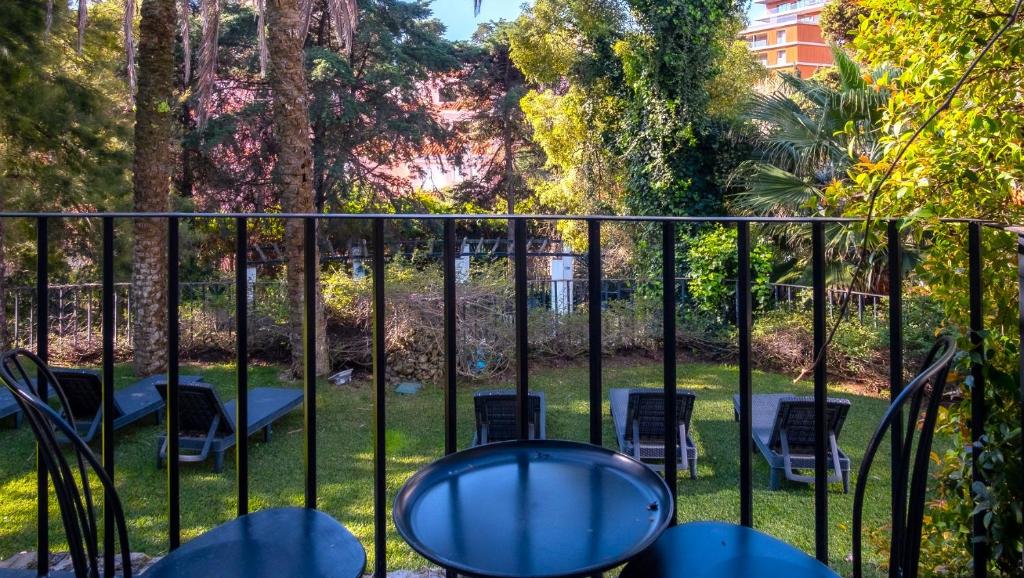 Um jardim em Casa Vela Boutique House