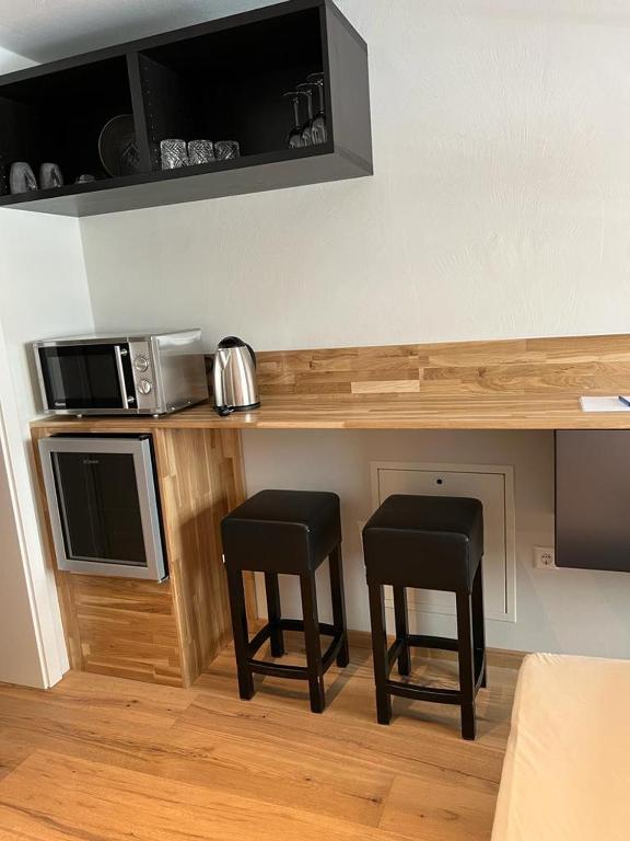 Kuchyň nebo kuchyňský kout v ubytování Apartmenthaus Wagner