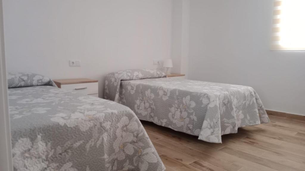 Postel nebo postele na pokoji v ubytování Apartamento La Saeta
