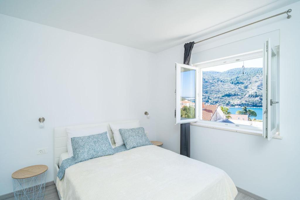 Postel nebo postele na pokoji v ubytování Apartment Olive 2