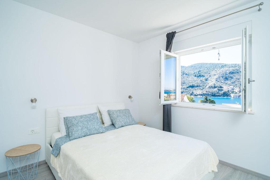 Postel nebo postele na pokoji v ubytování Apartment Olive 2