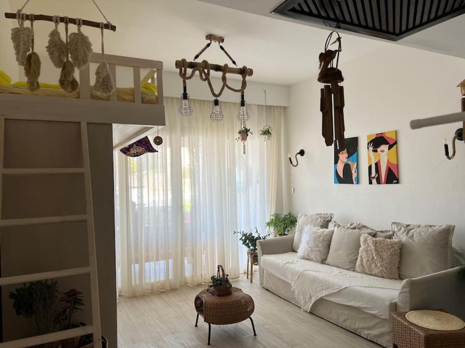 Classy studio at the beach with a pool