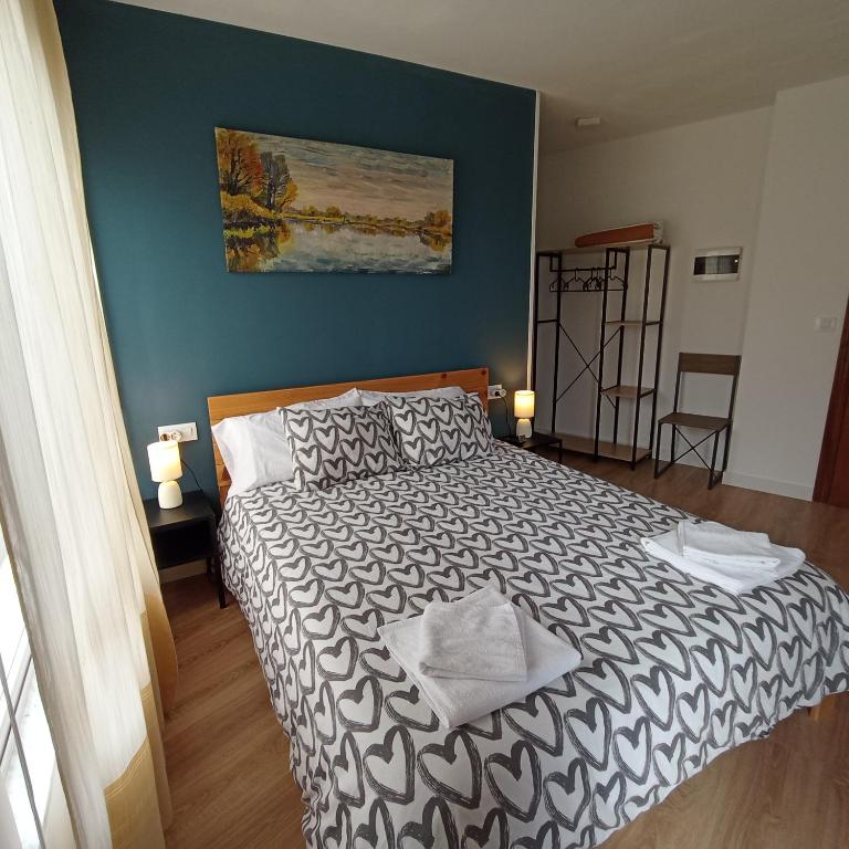 Postel nebo postele na pokoji v ubytování MyWay Albergue de Peregrinos